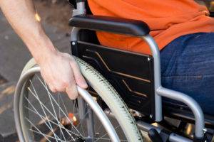 closeup of a person sitting in a wheelchair