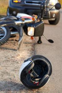 motorcycle accident with helmet in road